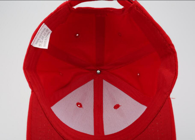 red baseball cap