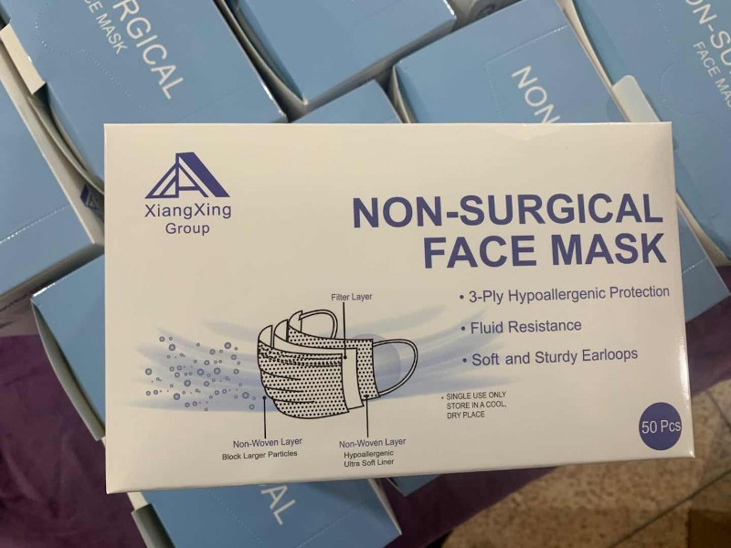 face masks are packed in paper box
